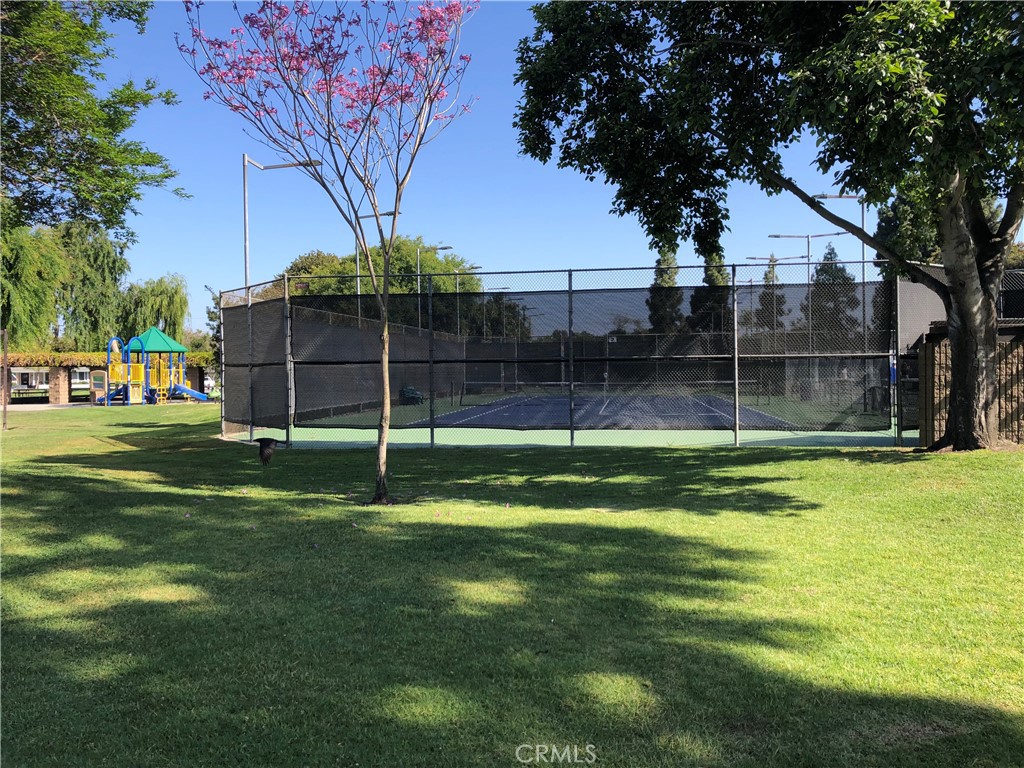 11402 Donovan Road Los Alamitos, CA 90720 - Photo 32 of 44 a backyard of a house with lots of green space