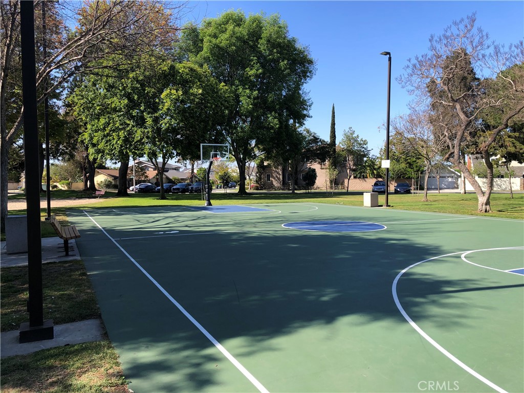 11402 Donovan Road Los Alamitos, CA 90720 - Photo 41 of 44 a view of a playground ground and a large tree