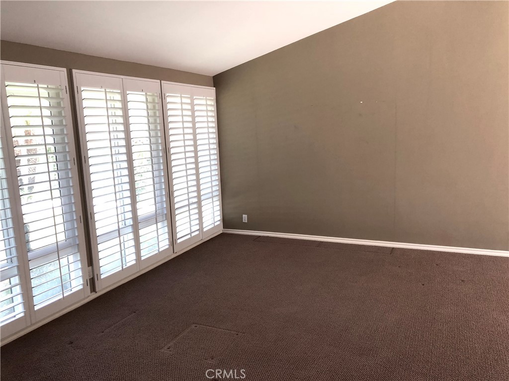 11402 Donovan Road Los Alamitos, CA 90720 - Photo 6 of 44 a view of an empty room with a window