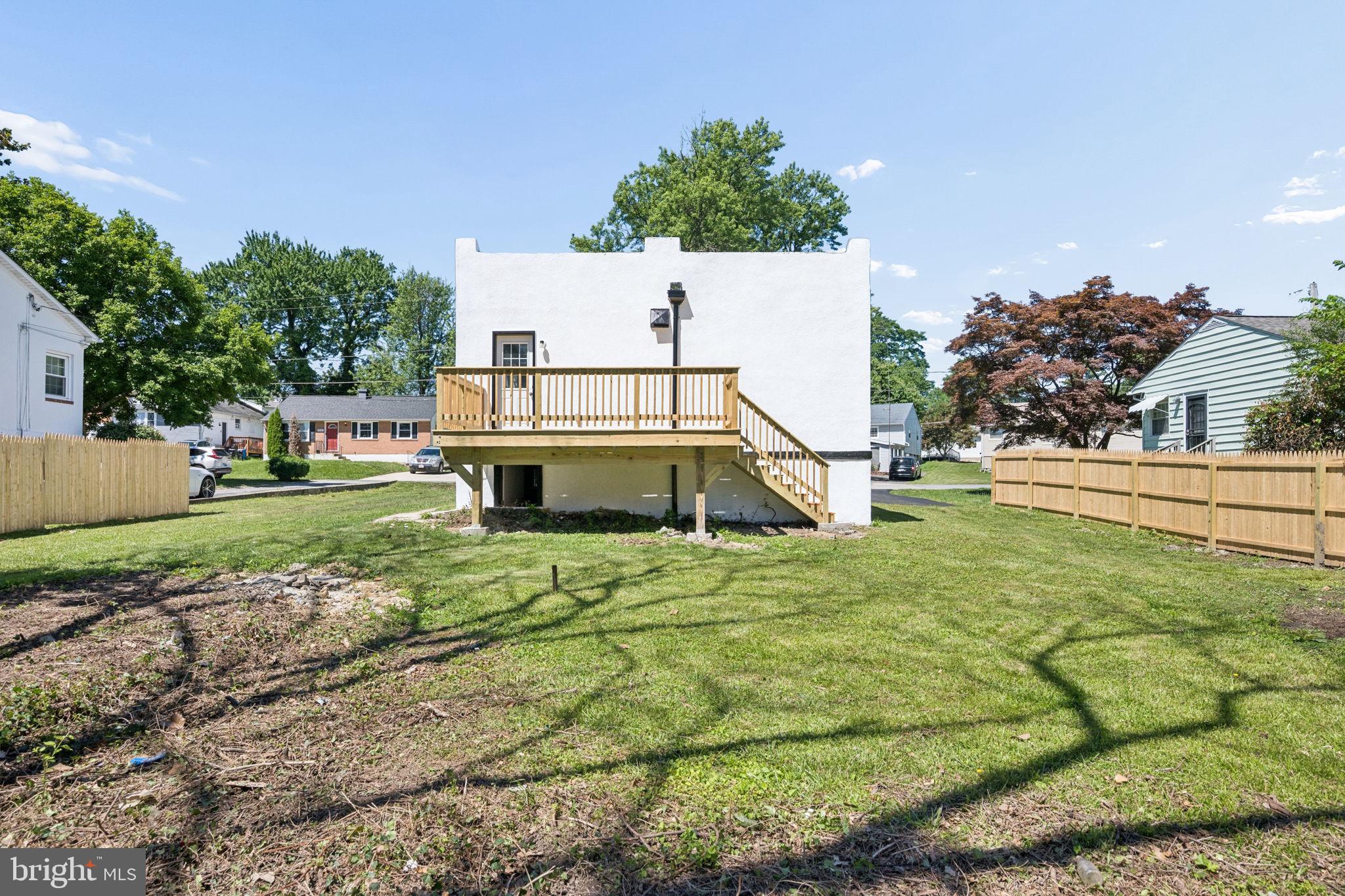 517 Valcour Road Baltimore, MD 21228 - Photo 42 of 47 a view of a house with a yard