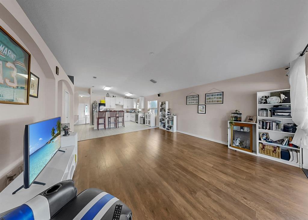 2310 Potomac Mark Place Ruskin, FL 33570 - Photo 12 of 40 a dinning room with furniture and wooden floor