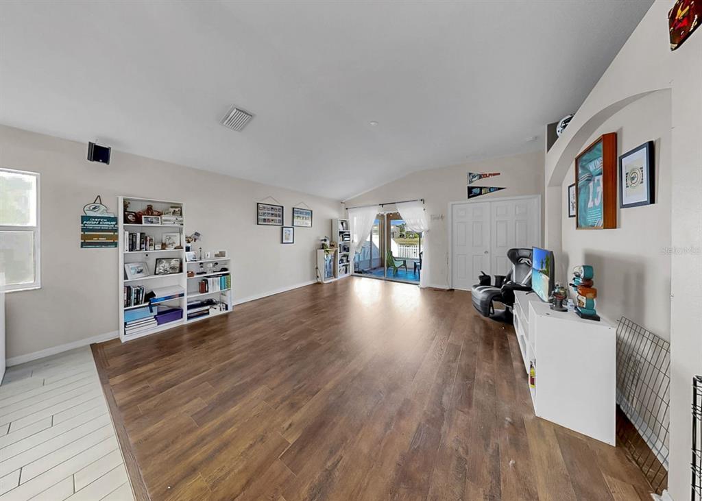 2310 Potomac Mark Place Ruskin, FL 33570 - Photo 13 of 40 a living room with furniture and a wooden floor