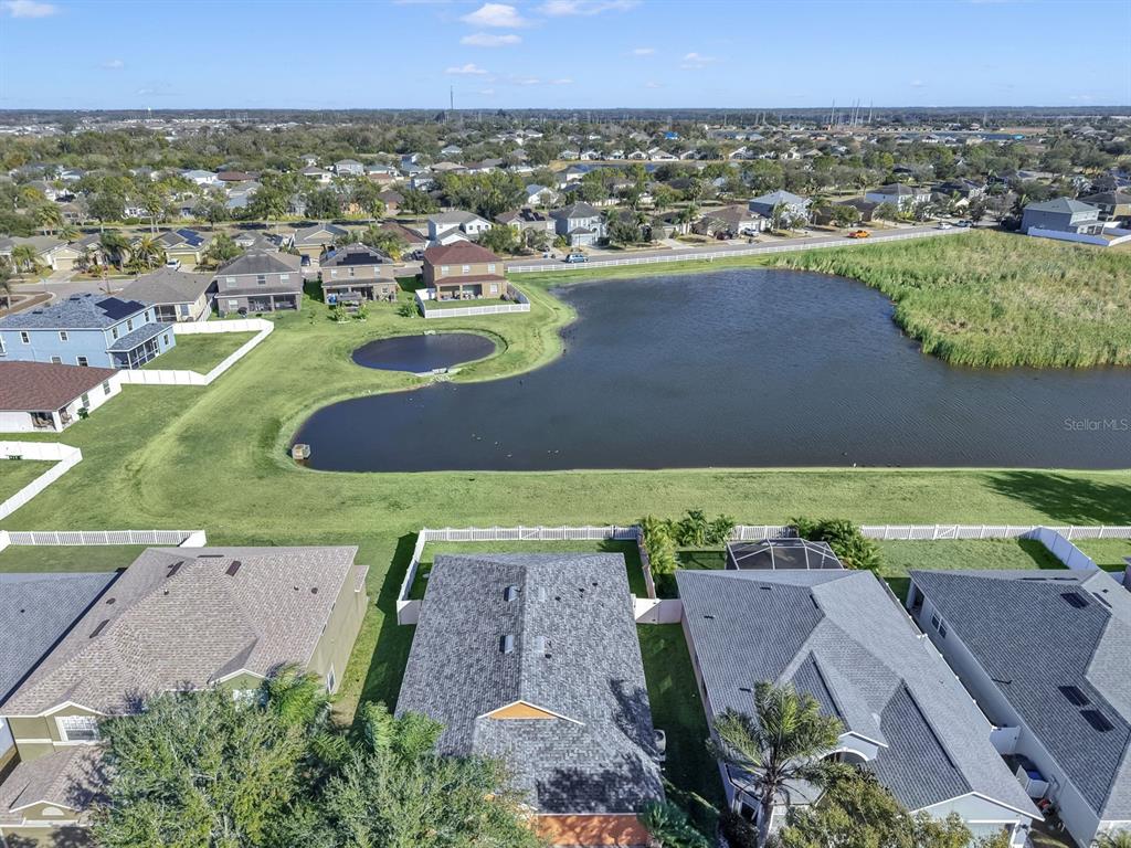 2310 Potomac Mark Place Ruskin, FL 33570 - Photo 2 of 40 an aerial view of residential houses with outdoor space and lake view