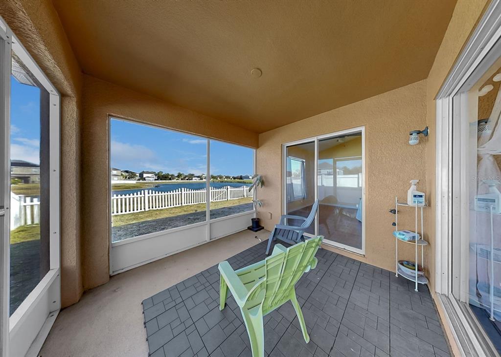 2310 Potomac Mark Place Ruskin, FL 33570 - Photo 30 of 40 a view of an chairs and table in balcony with backyard