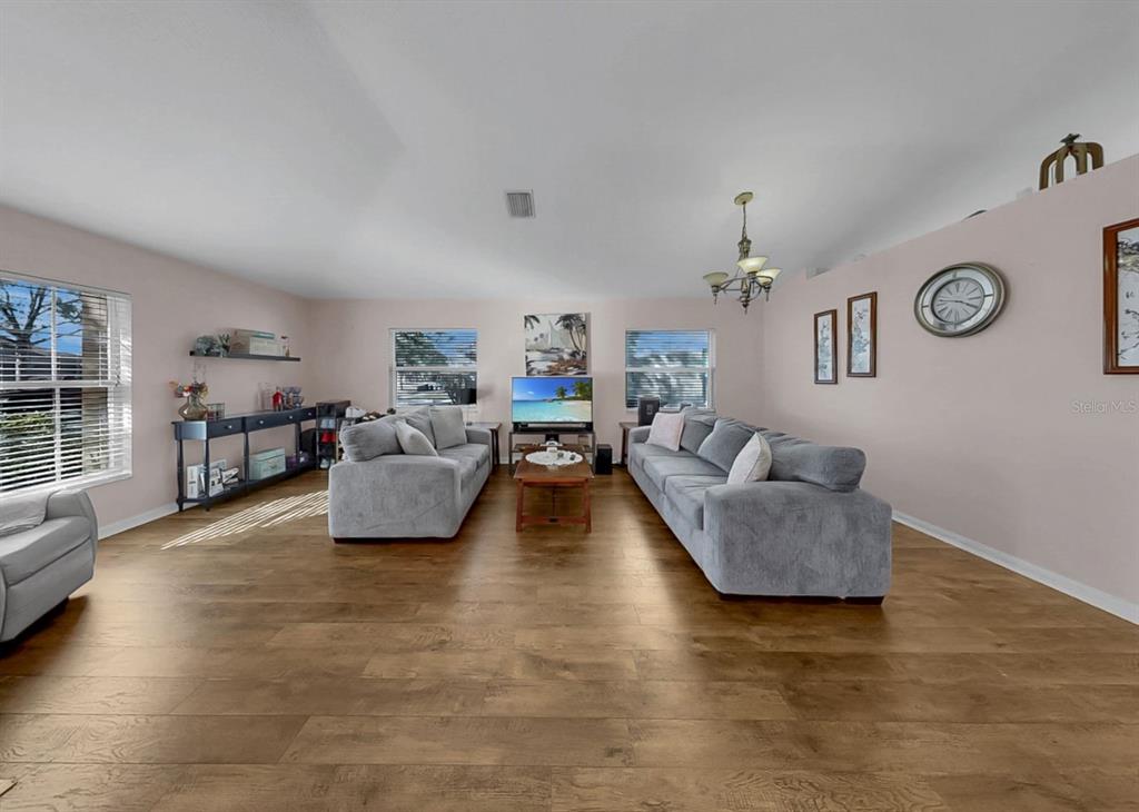 2310 Potomac Mark Place Ruskin, FL 33570 - Photo 3 of 40 a living room with furniture and a large window