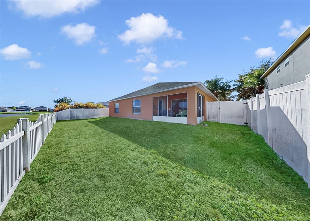 2310 Potomac Mark Place Ruskin, FL 33570 - Photo 32 of 40 a view of house with backyard and entertaining space