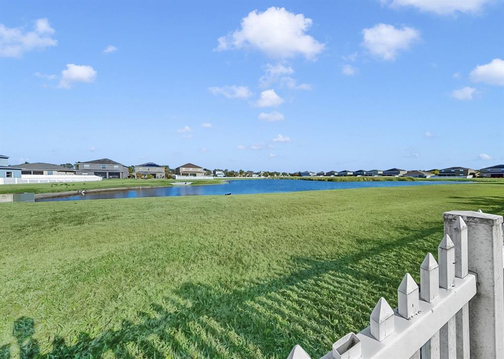 2310 Potomac Mark Place Ruskin, FL 33570 - Photo 33 of 40 a view of a city with lawn chairs and large trees