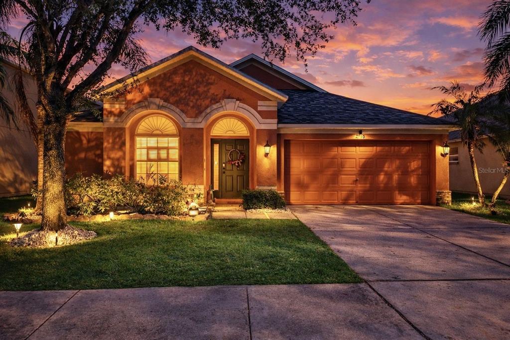 2310 Potomac Mark Place Ruskin, FL 33570 - Photo 40 of 40 a front view of a house with garden