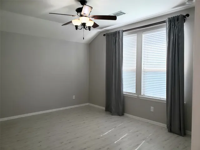 a bathroom with a sink double vanity and a mirror