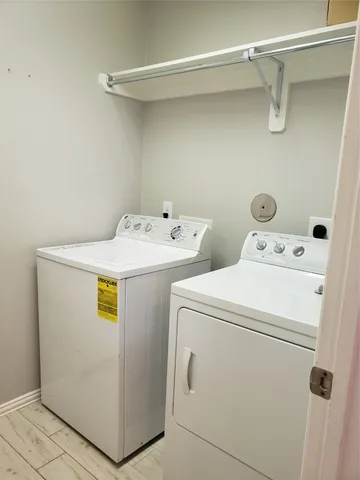 a view of an empty room with empty shelves