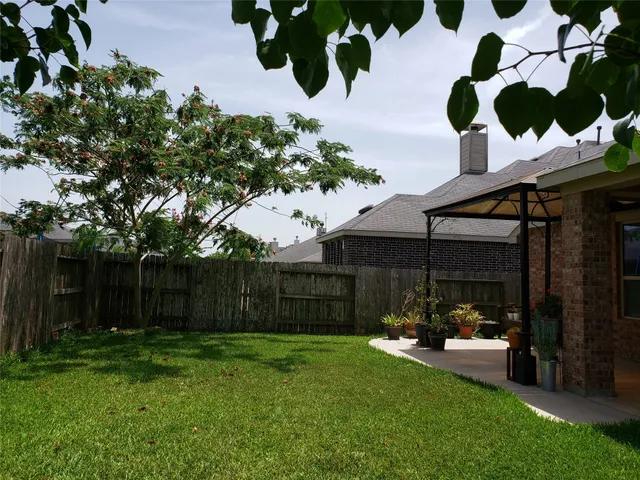a view of a patio in front of house