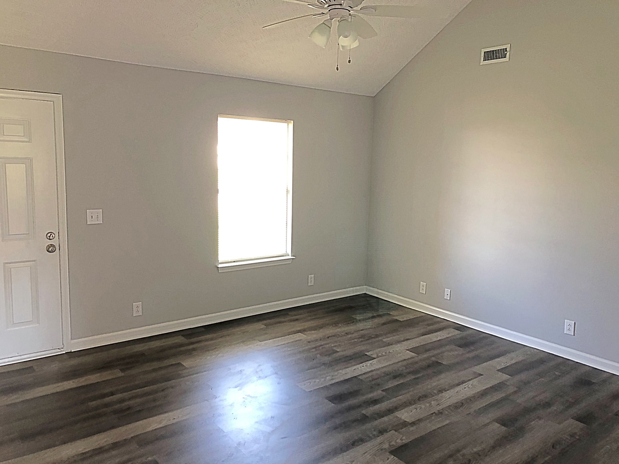 672 Crescent Road Murfreesboro, TN 37128 - Photo 4 of 20 an empty room with wooden floor and windows