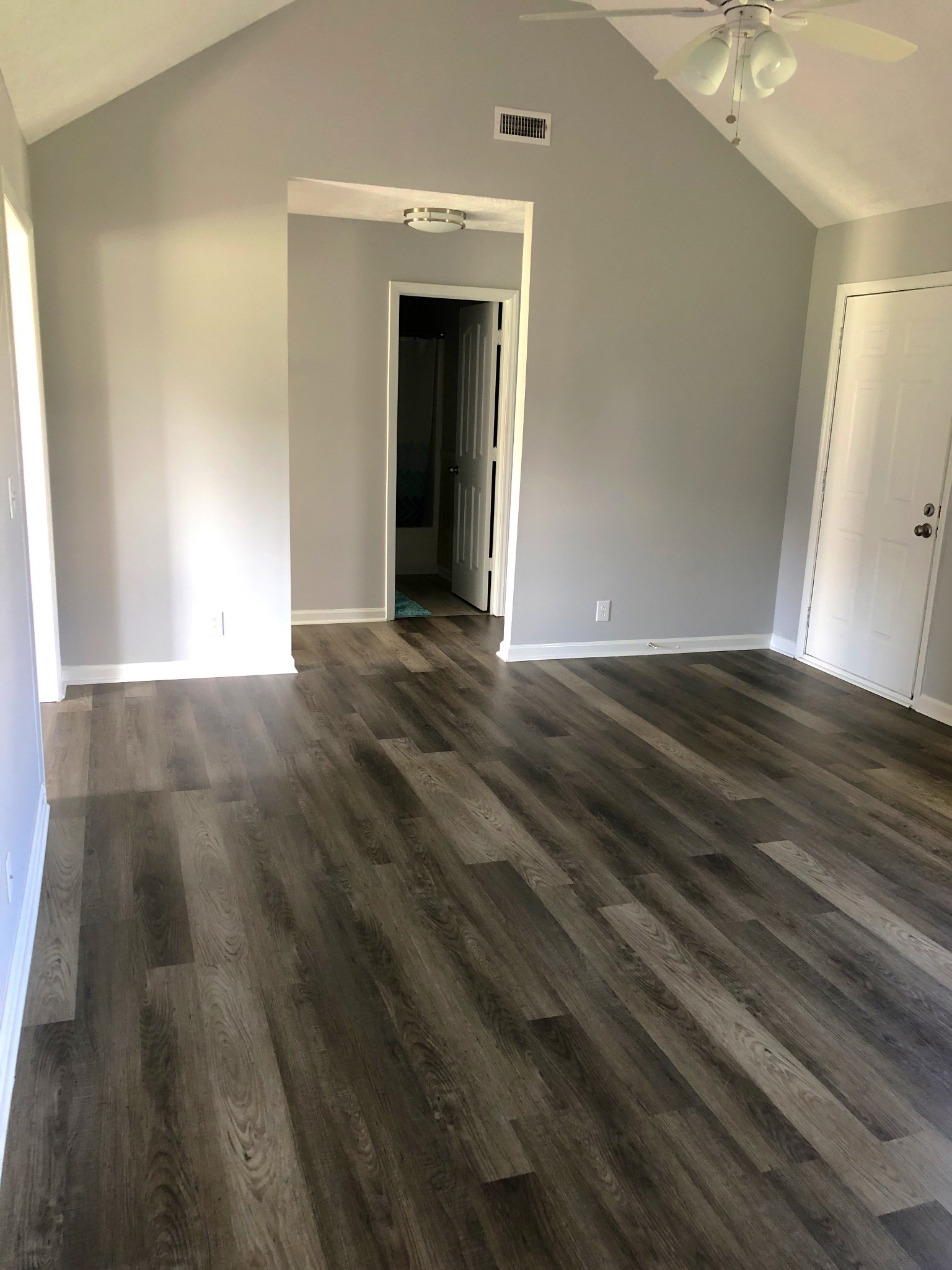 672 Crescent Road Murfreesboro, TN 37128 - Photo 5 of 20 a view of an empty room with wooden floor and a window
