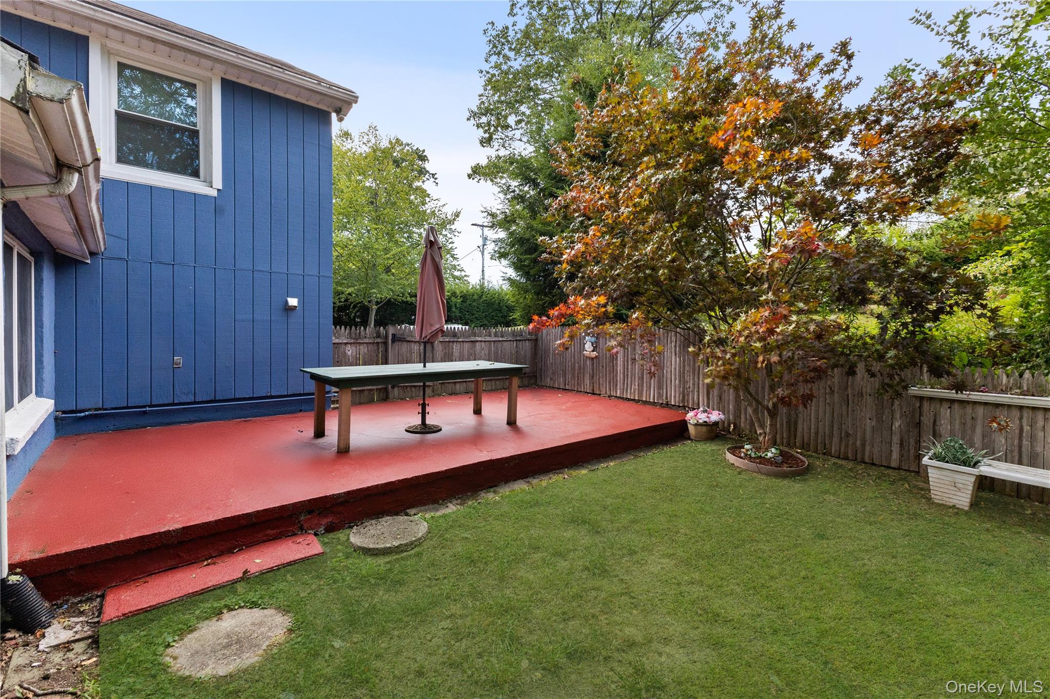 11 Orleans Road Patterson, NY 12563 - Photo 15 of 23 Back deck featuring a fenced backyard