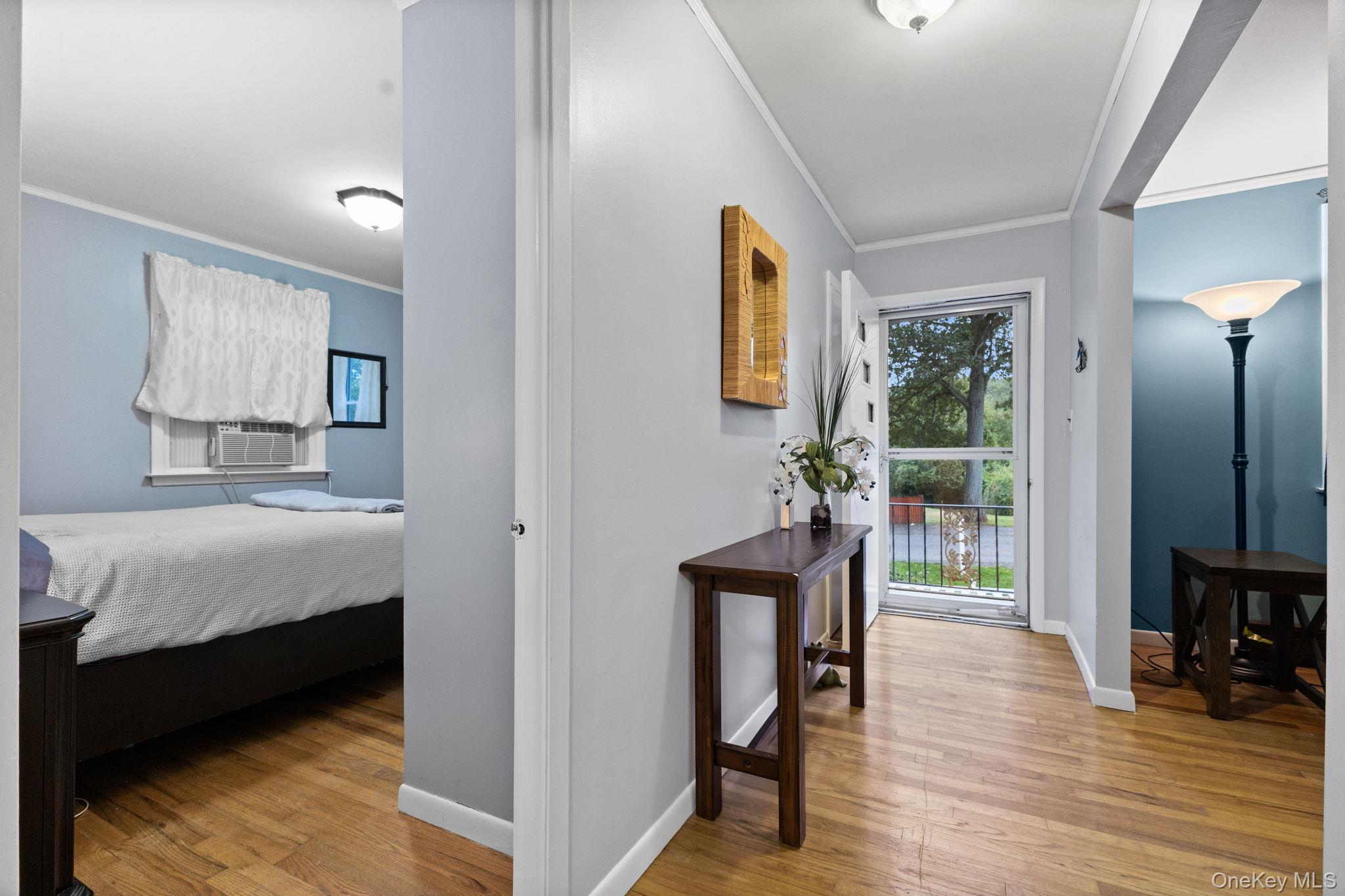 11 Orleans Road Patterson, NY 12563 - Photo 2 of 23 Front entry of upper level with view of bedroom and living room