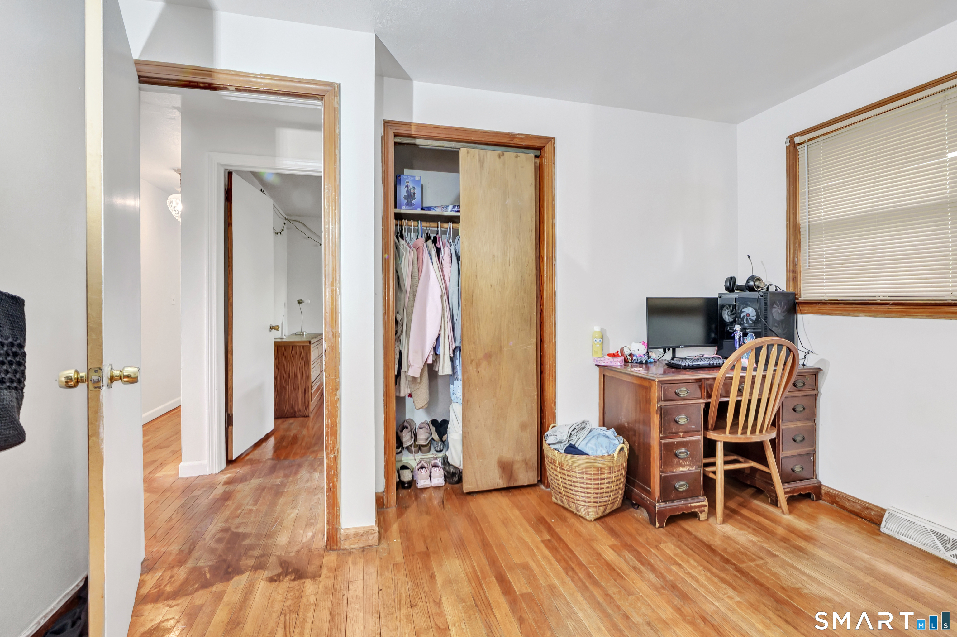 136 Harrison Drive Hamden, CT 06514 - Photo 11 of 20 a view of a room with furniture and wooden floor