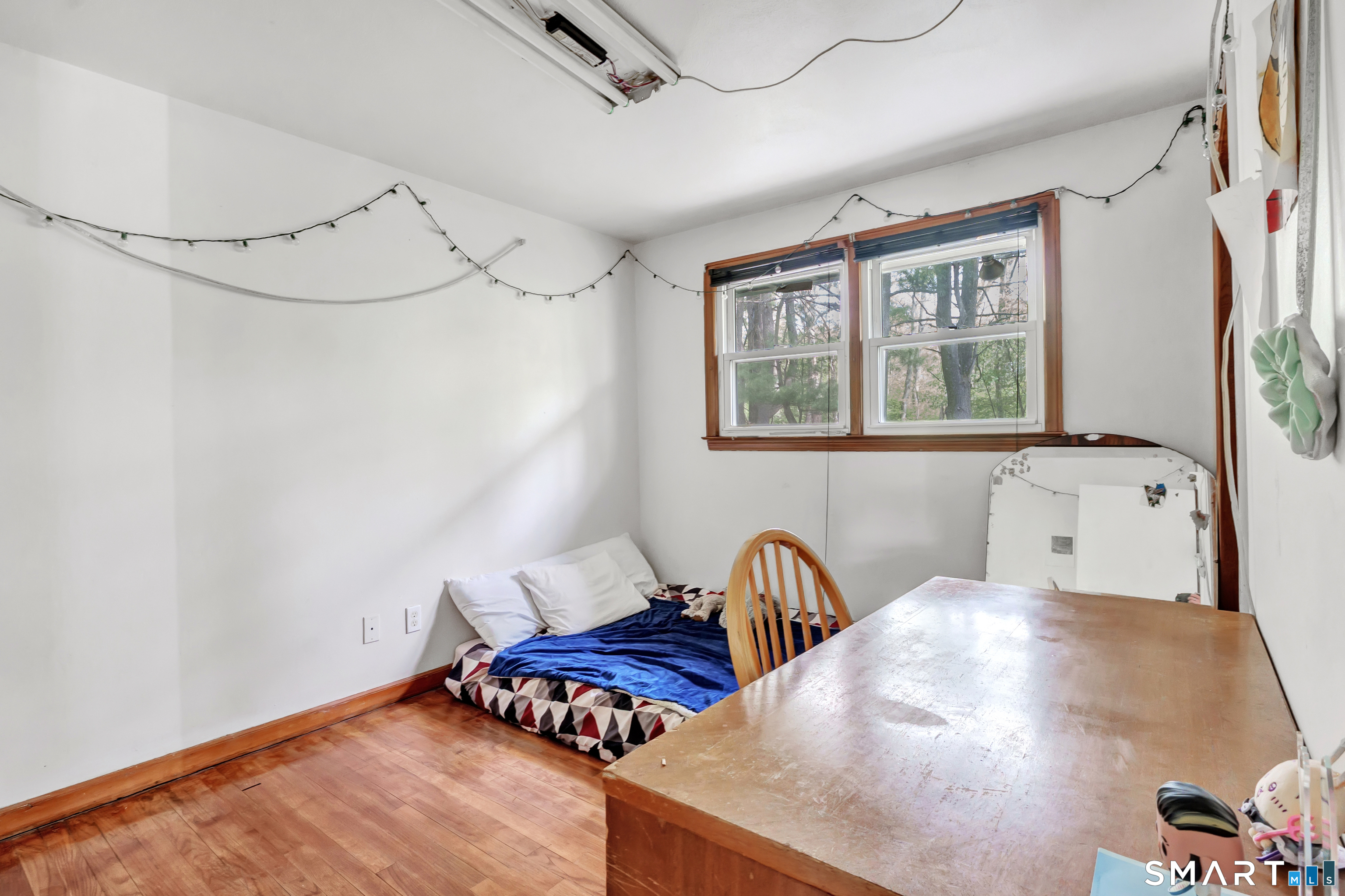 136 Harrison Drive Hamden, CT 06514 - Photo 13 of 20 a bedroom with furniture and a window