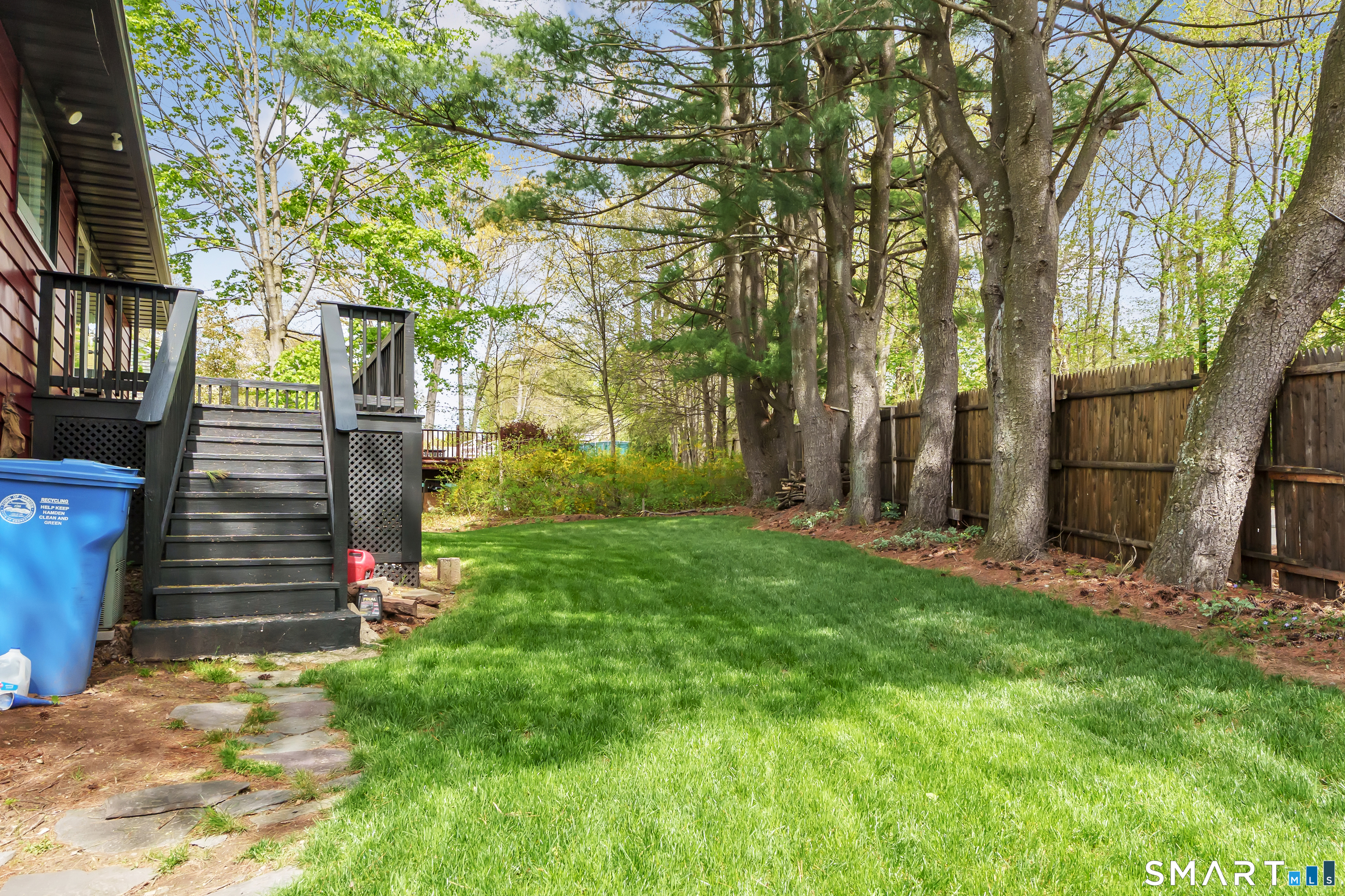 136 Harrison Drive Hamden, CT 06514 - Photo 20 of 20 a view of house with backyard