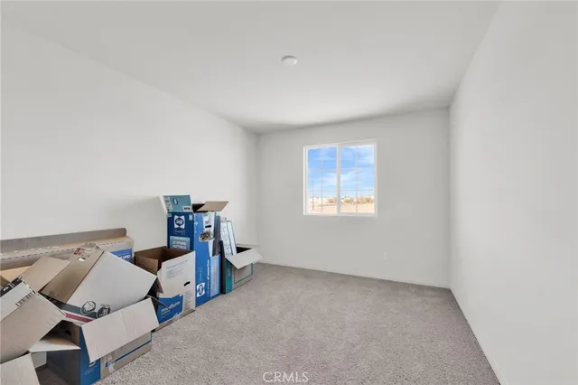 a bathroom with a double vanity sink a mirror and a bathtub