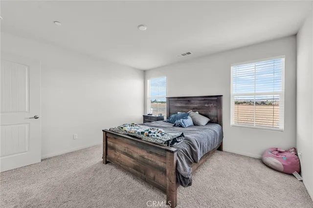 a bathroom with a bathtub and a sink