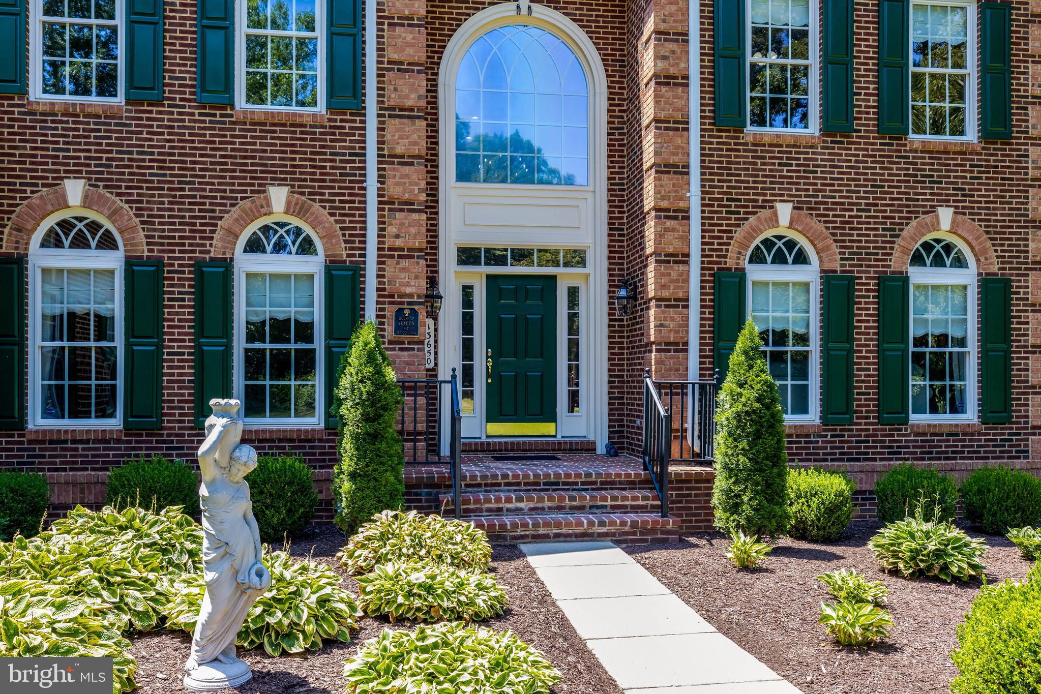 13650 Independence Ridge Nokesville, VA 20181 - Photo 4 of 98 Portico Entrance with Decorative Landscaping