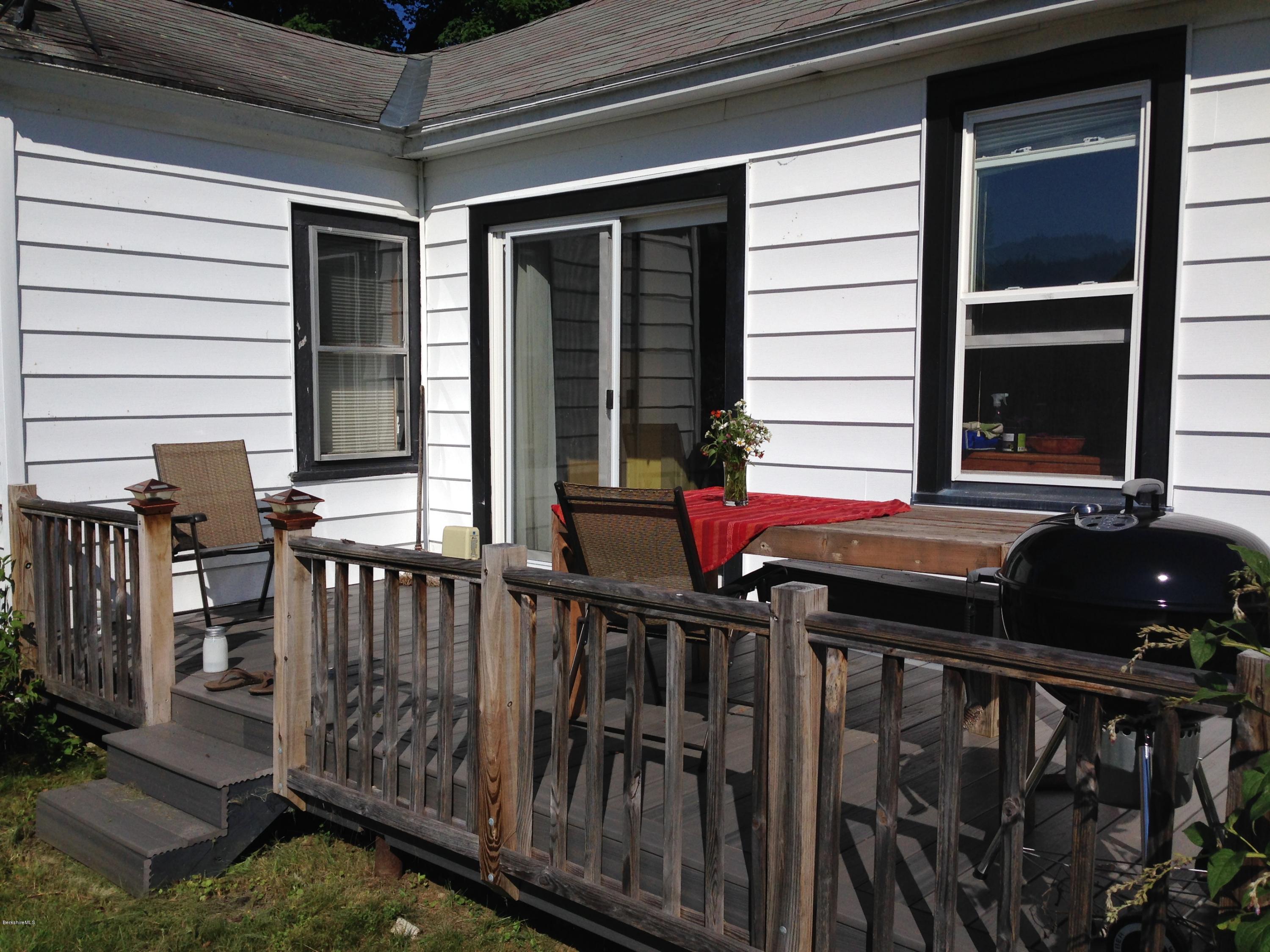 1124 Bancroft Road Becket, MA 01223 - Photo 22 of 23 a view of balcony with two potted plants