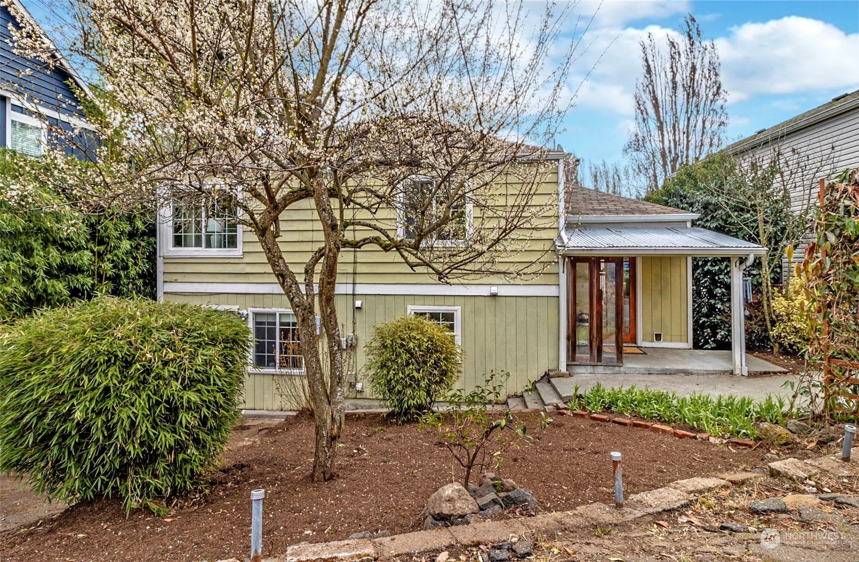 9048 3rd Avenue South Seattle, WA 98108 - Photo 1 of 36 a front view of a house with garden