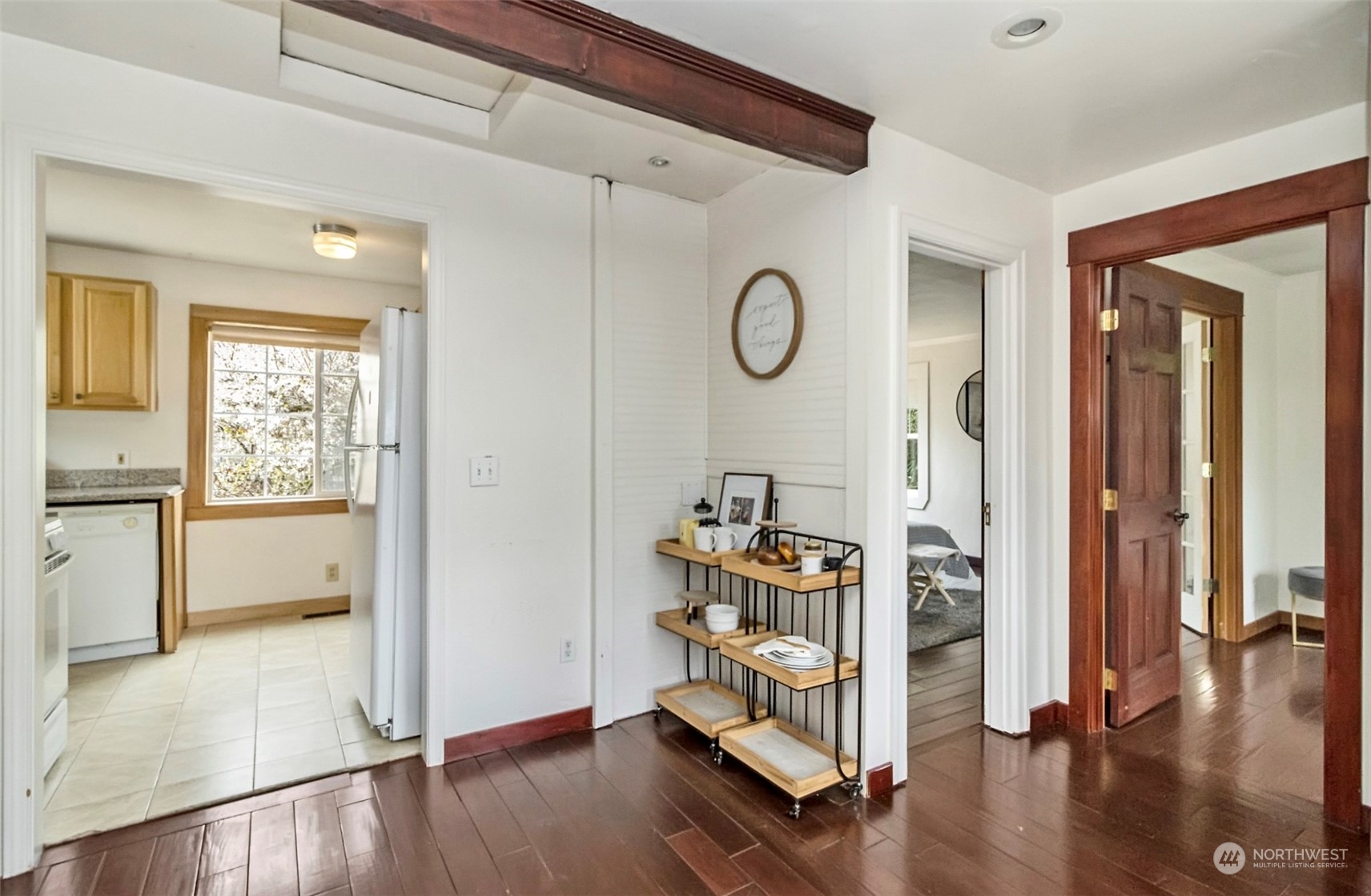 9048 3rd Avenue South Seattle, WA 98108 - Photo 13 of 36 a view of a hallway with wooden floor and furniture