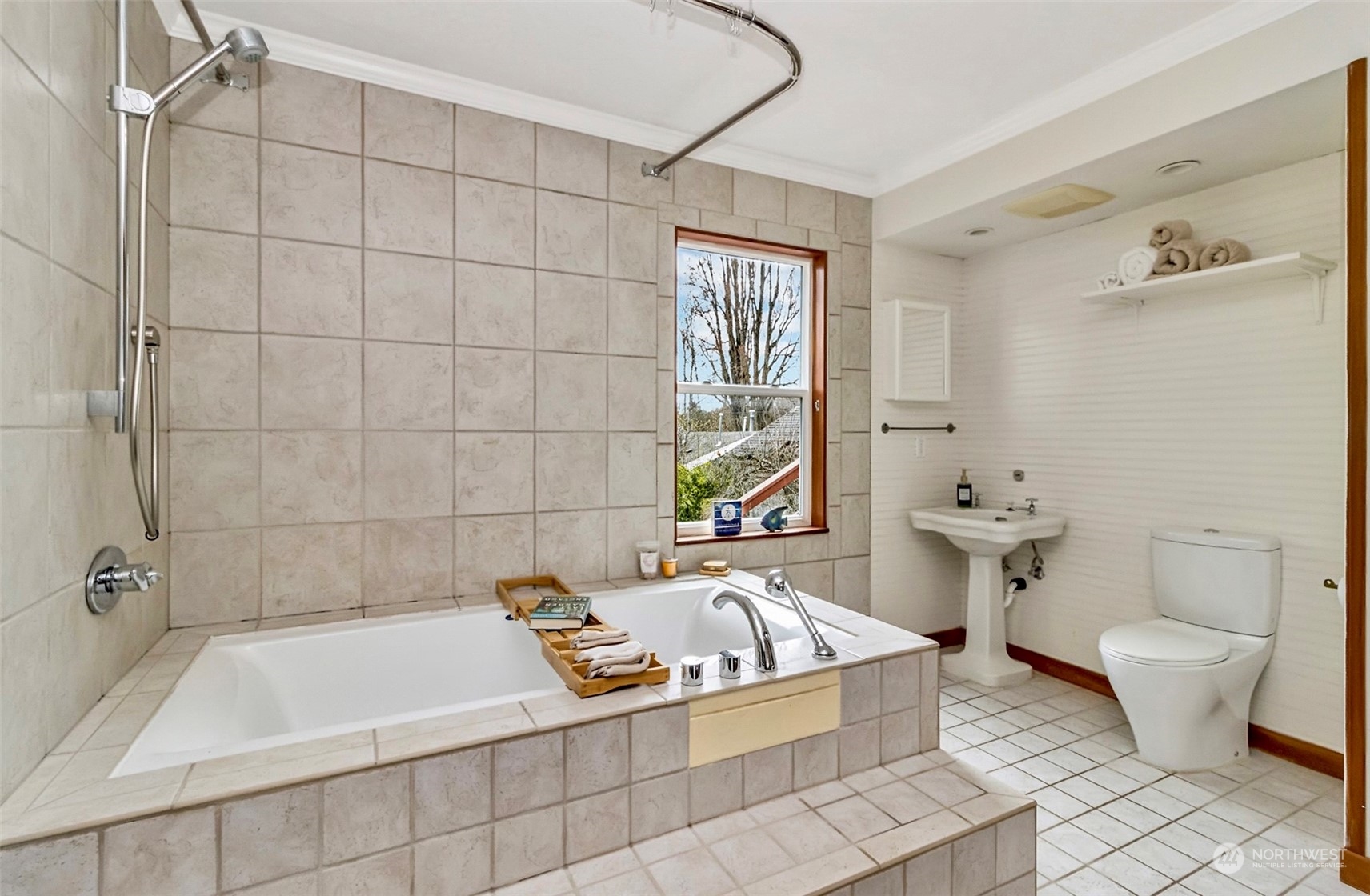 9048 3rd Avenue South Seattle, WA 98108 - Photo 16 of 36 a bath tub sitting next to a white toilet and a shower