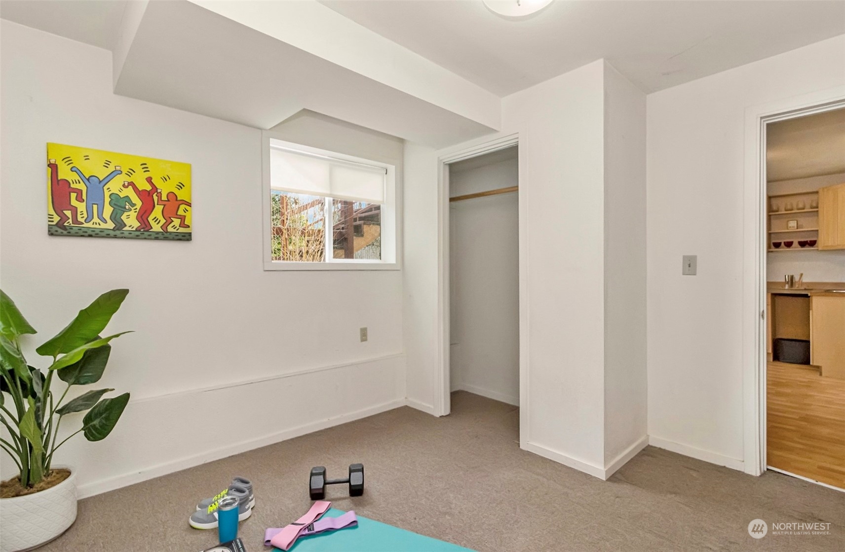 9048 3rd Avenue South Seattle, WA 98108 - Photo 29 of 36 a hallway with toys and wooden floor