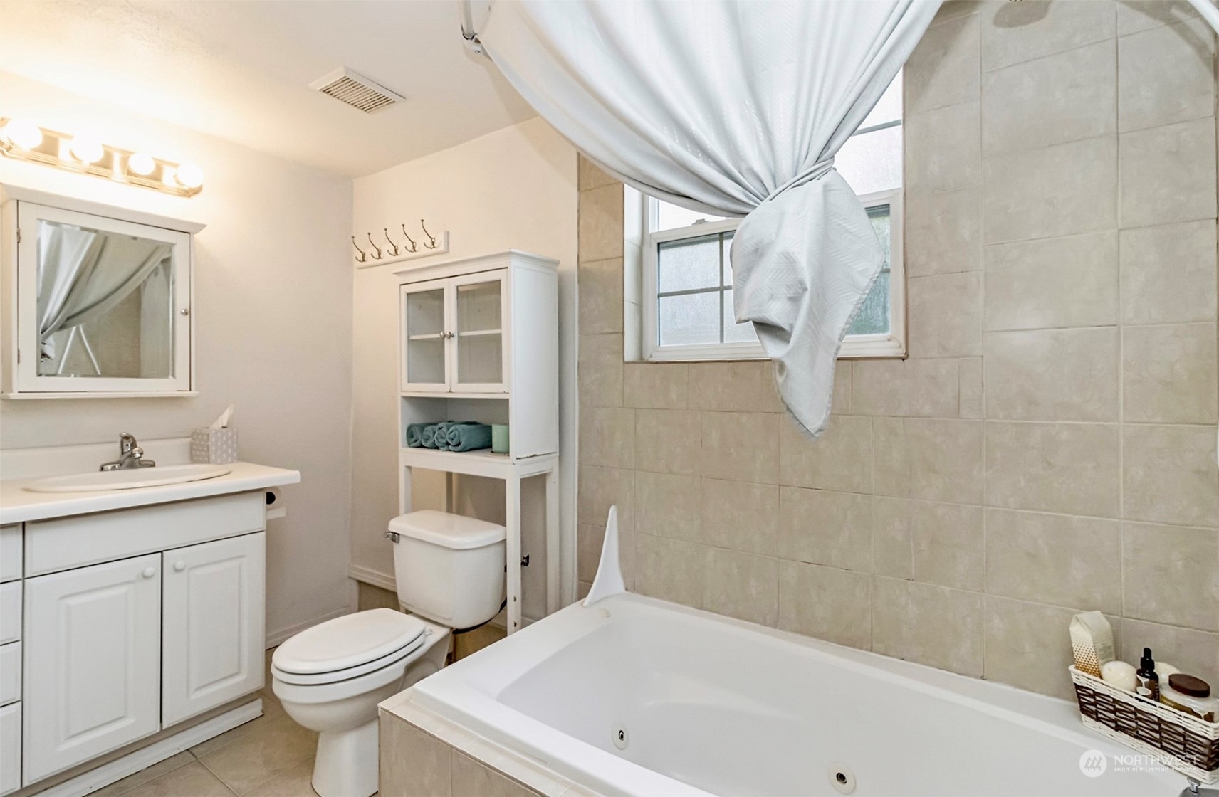 9048 3rd Avenue South Seattle, WA 98108 - Photo 30 of 36 a white toilet sitting next to a bathroom sink