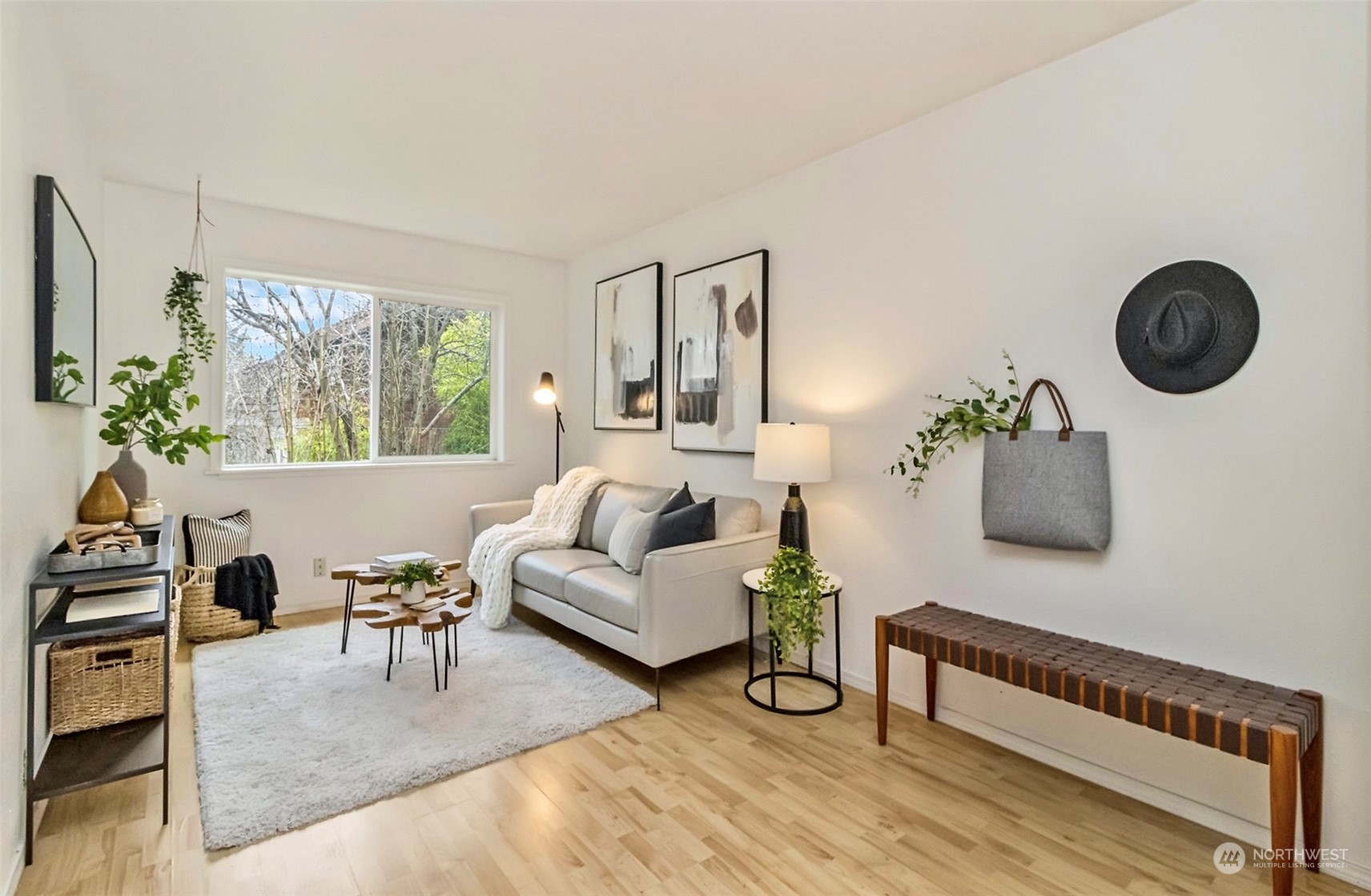 9048 3rd Avenue South Seattle, WA 98108 - Photo 4 of 36 a living room with furniture and a wooden floor