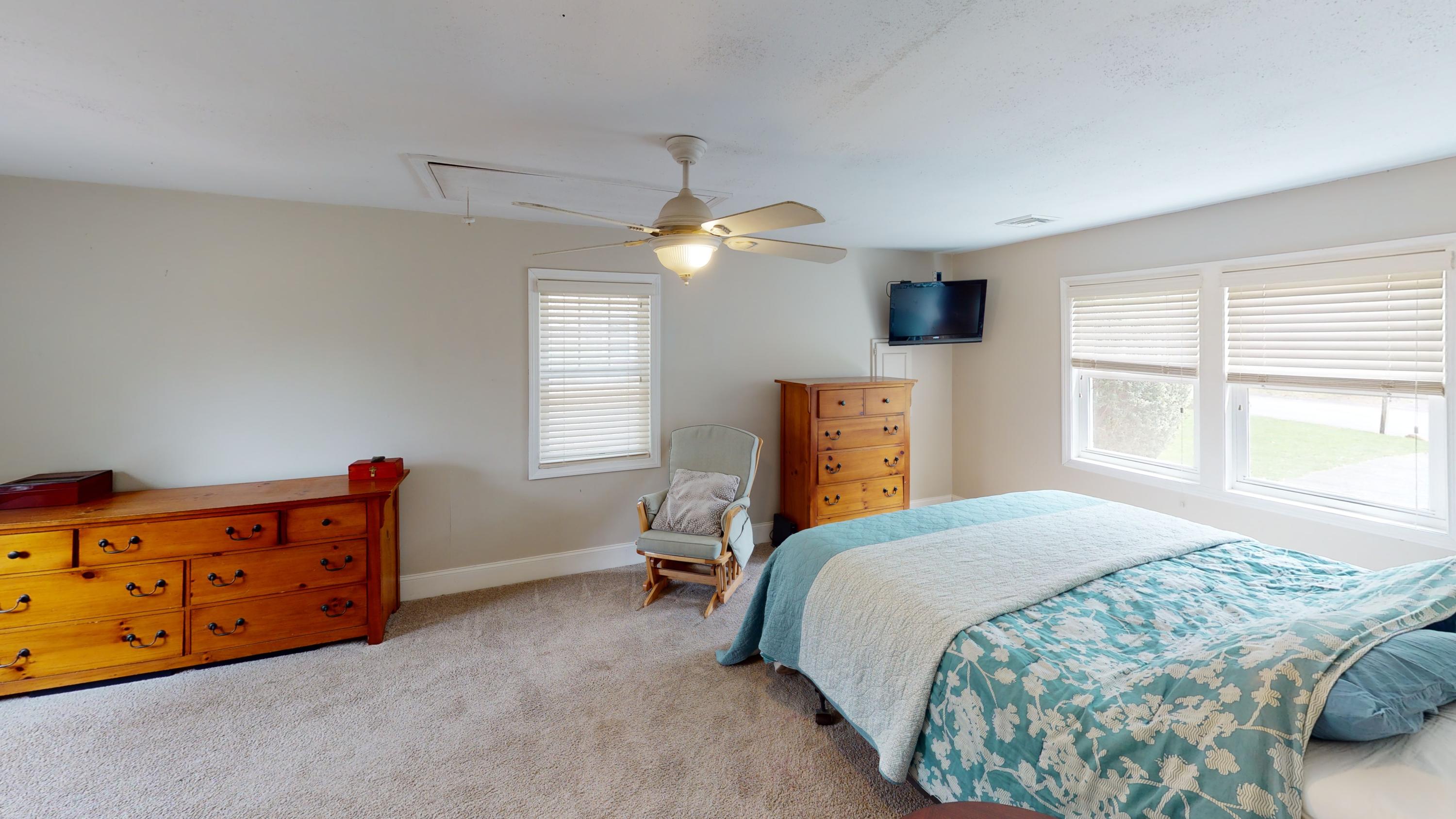 116 Oldham Road Osterville, MA 02655 - Photo 13 of 29 a bedroom with a bed and a dresser