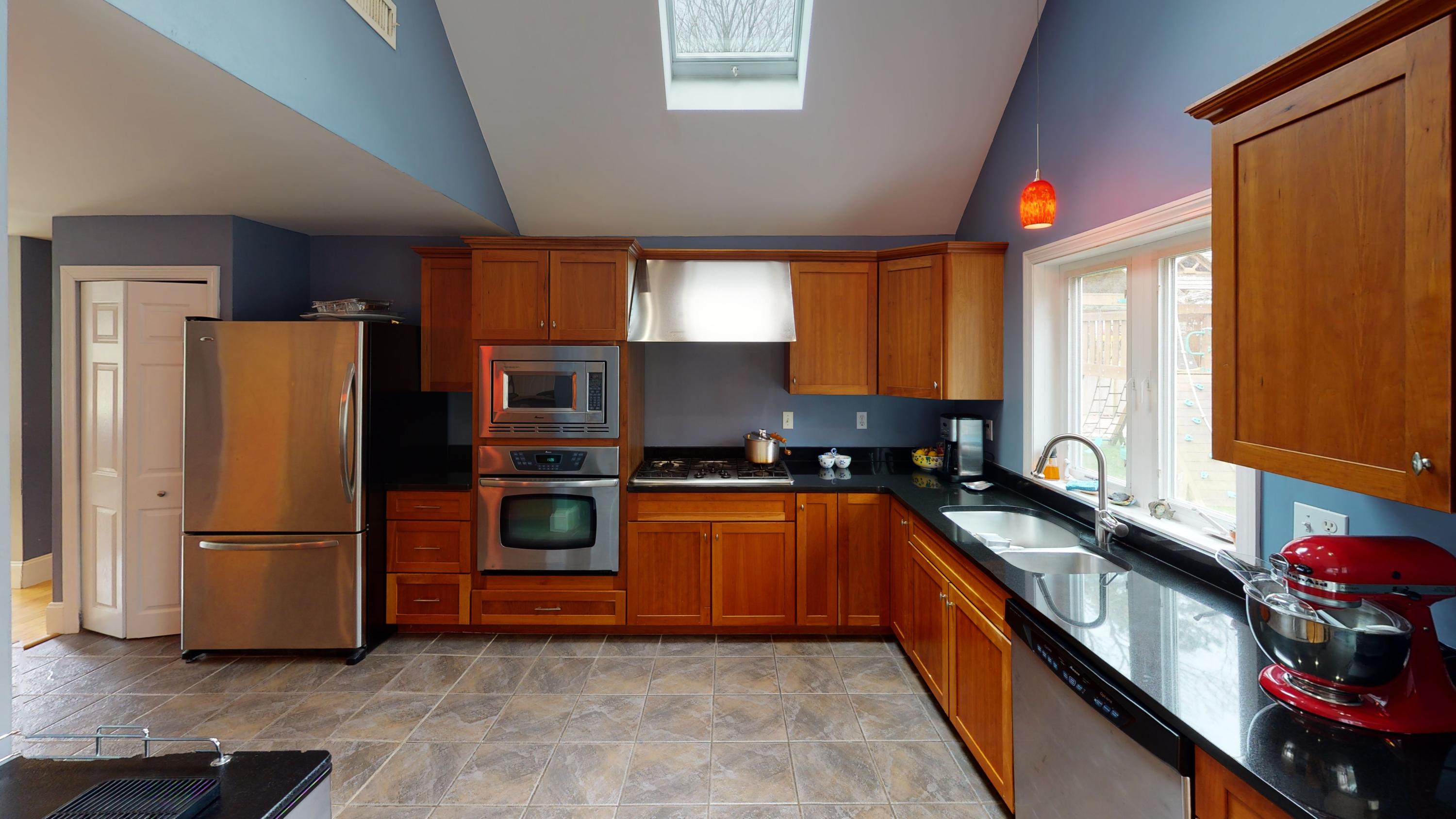 116 Oldham Road Osterville, MA 02655 - Photo 17 of 29 a kitchen with stainless steel appliances granite countertop a refrigerator a sink a stove a microwave and island