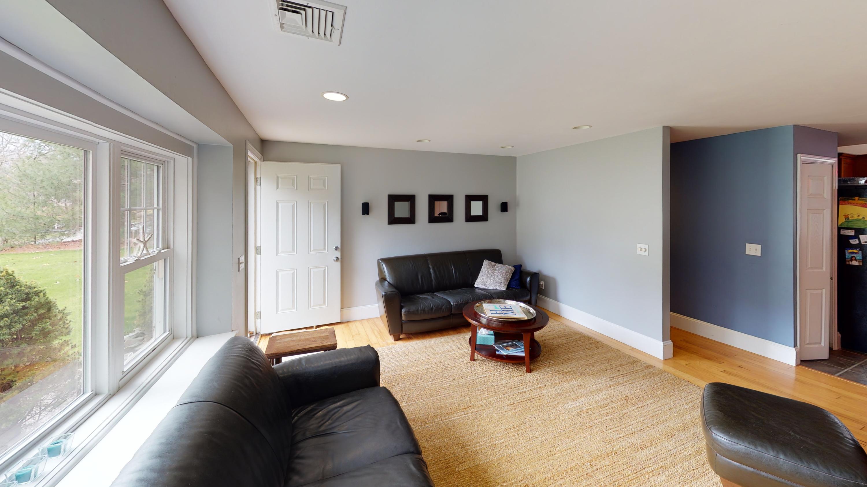 116 Oldham Road Osterville, MA 02655 - Photo 19 of 29 a living room with furniture and a large window