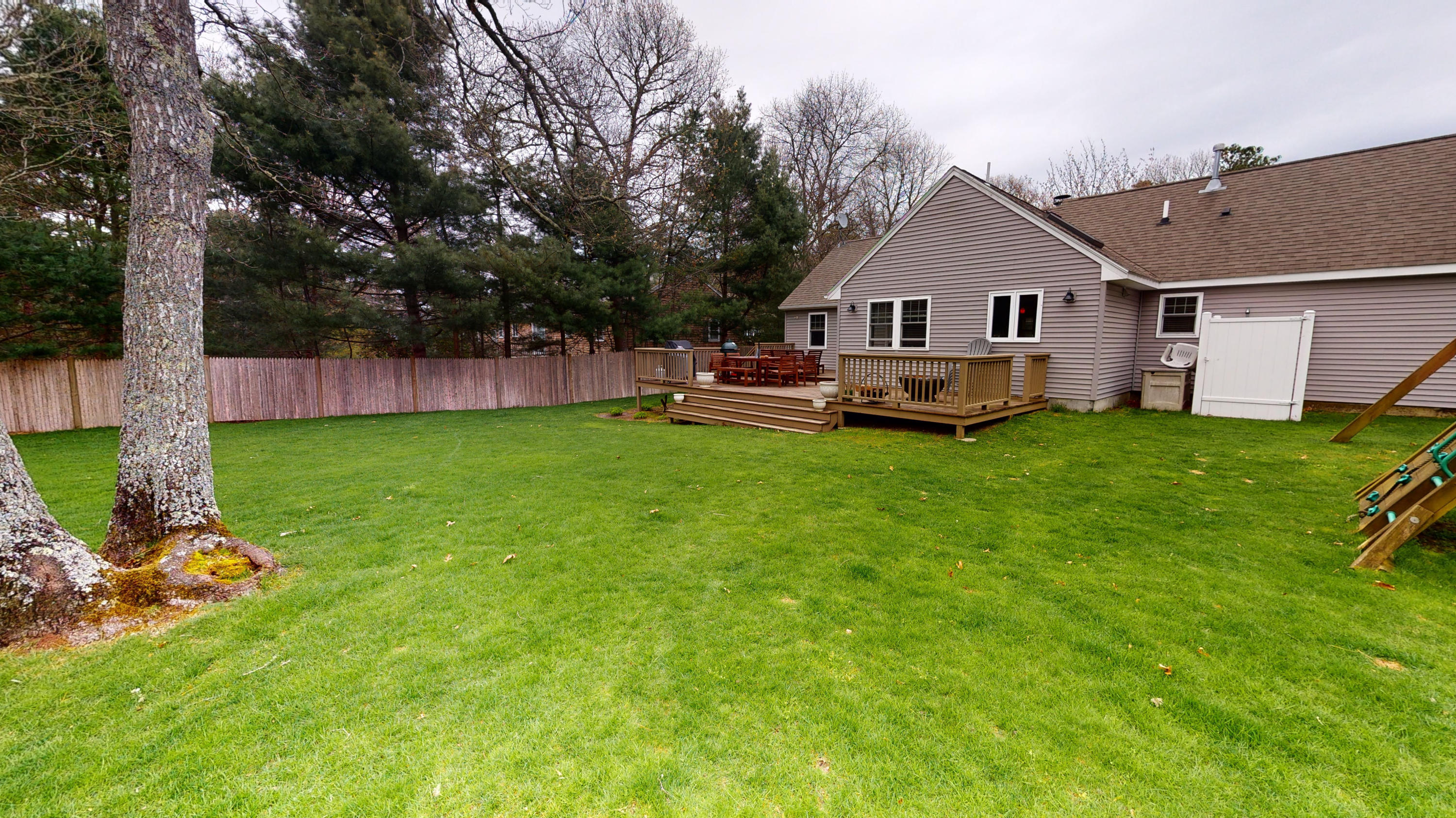 116 Oldham Road Osterville, MA 02655 - Photo 24 of 29 a view of a house with a yard and sitting area