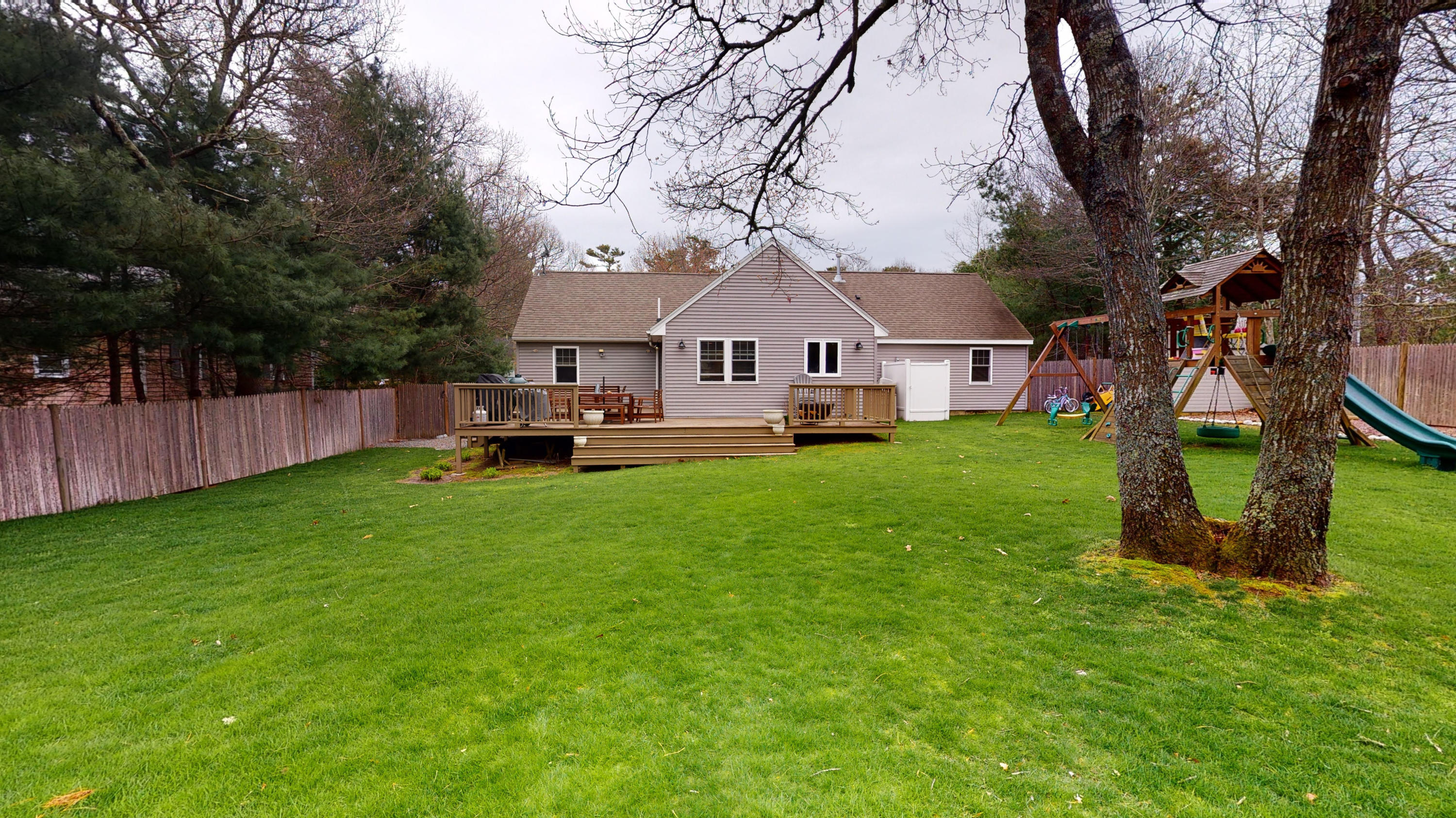 116 Oldham Road Osterville, MA 02655 - Photo 25 of 29 a front view of house with yard and green space