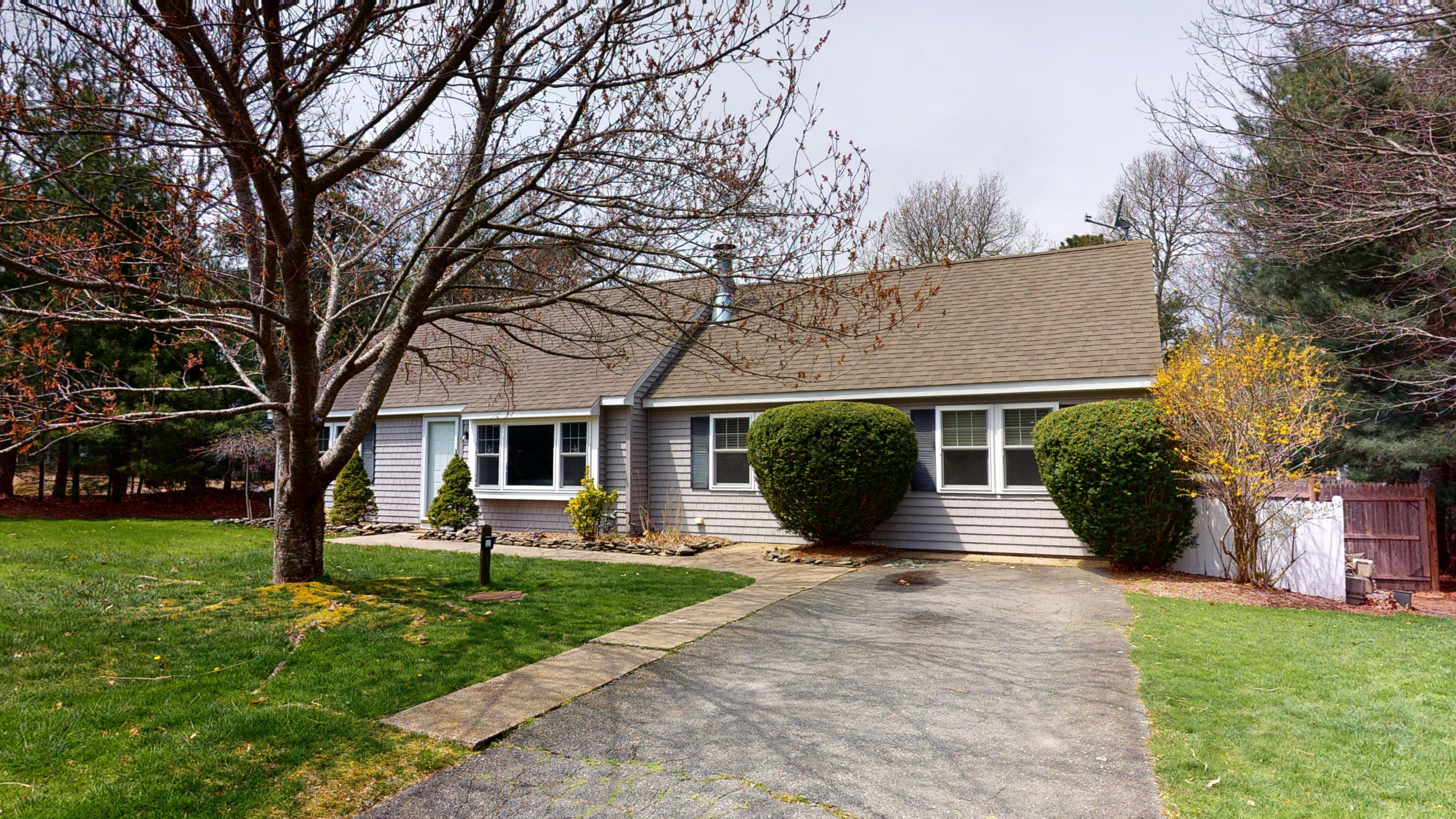 116 Oldham Road Osterville, MA 02655 - Photo 28 of 29 a front view of house with yard and green space