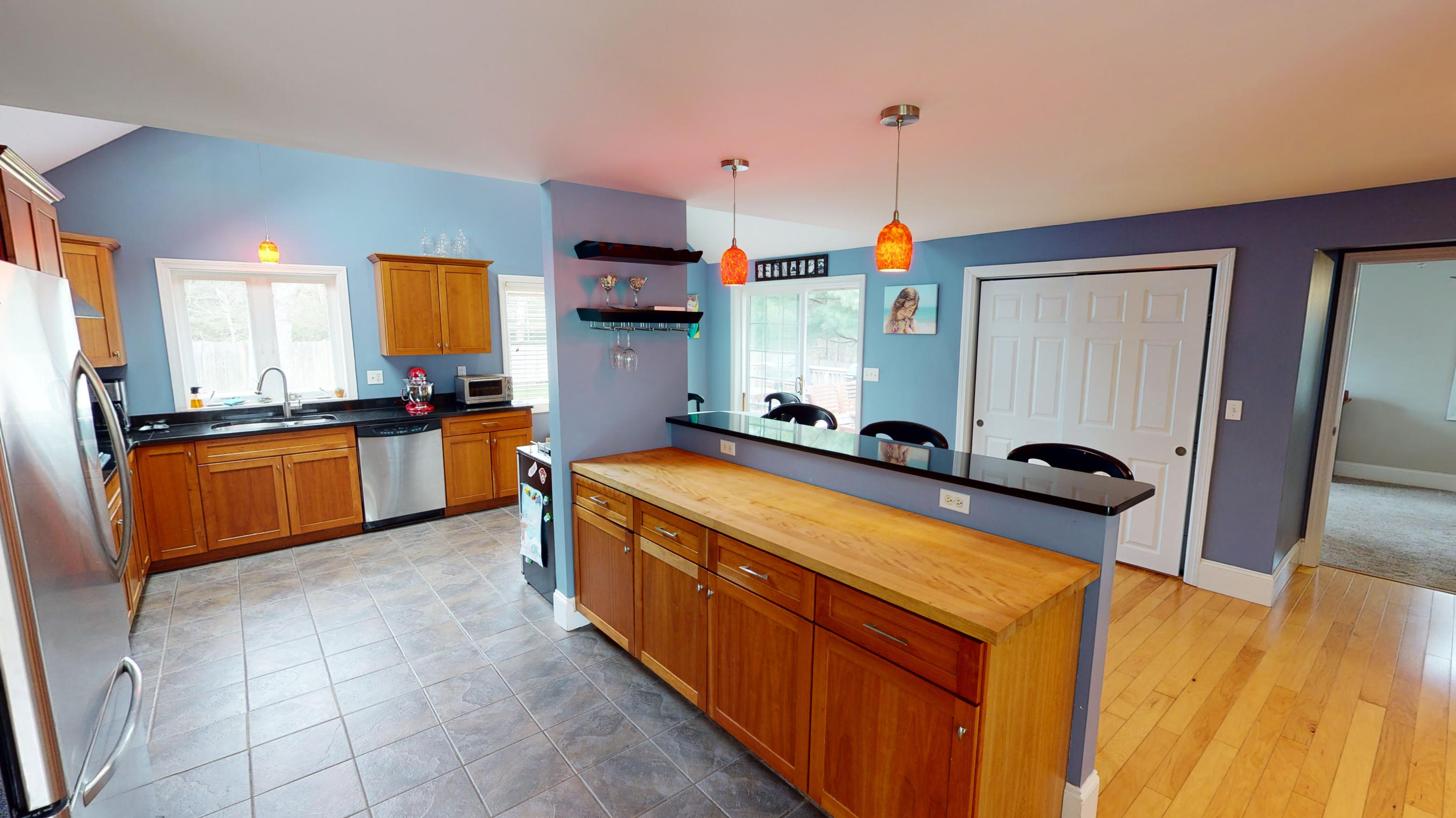 116 Oldham Road Osterville, MA 02655 - Photo 3 of 29 a kitchen with stainless steel appliances granite countertop a sink a stove and a refrigerator