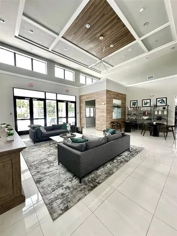 a living room with furniture and view of living room