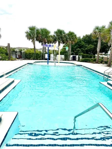 a view of green field with house