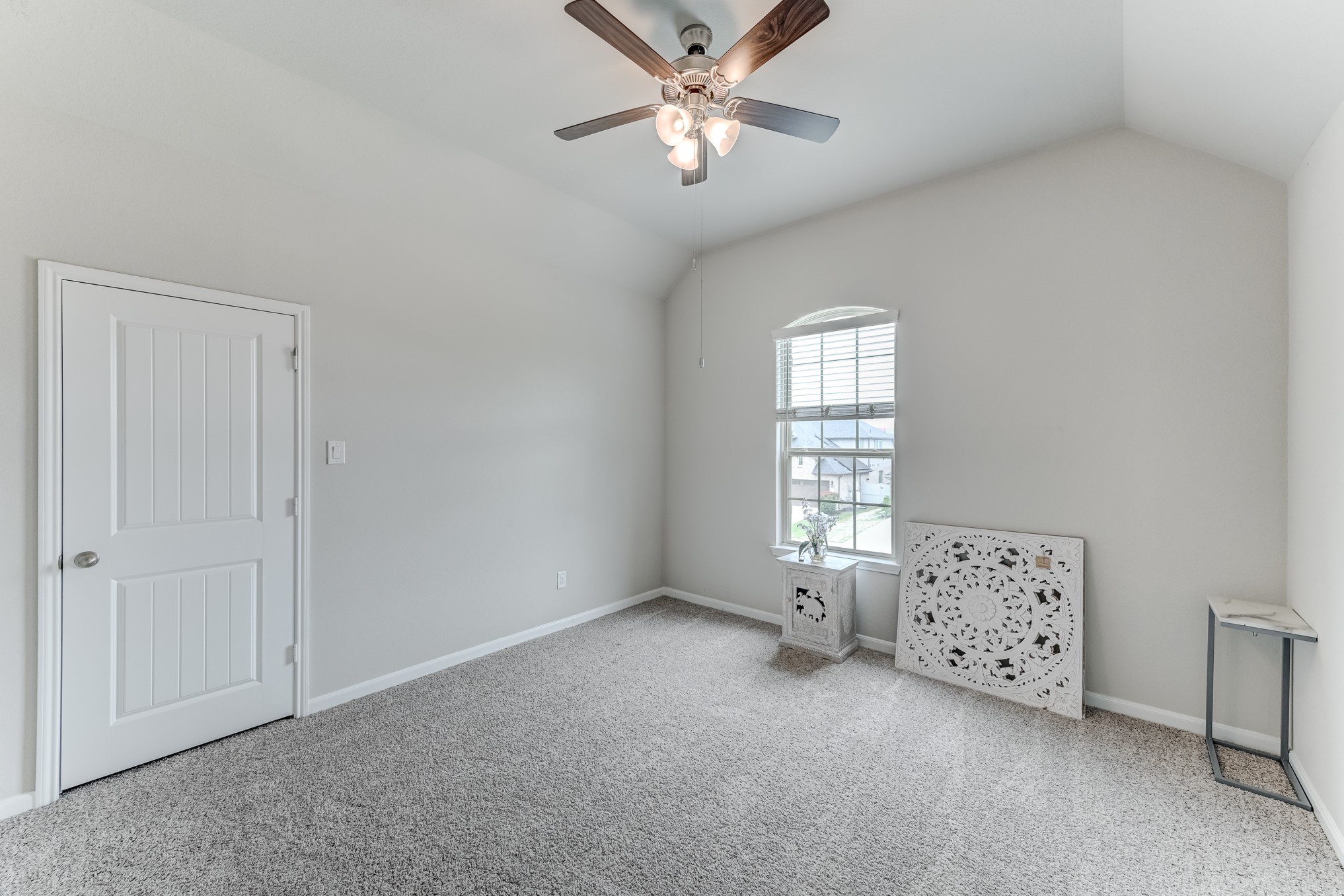 5806 Metaphor Way Rosenberg, TX 77469 - Photo 33 of 50 an empty room with windows and fan