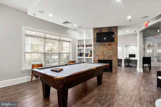 a view of a living room and dining room