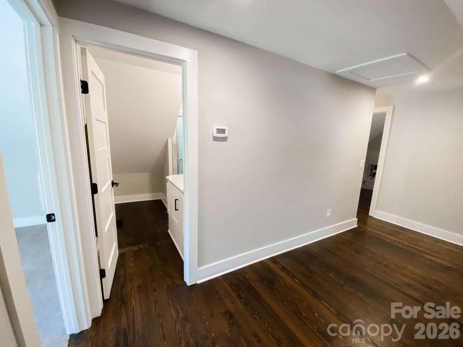 141 Carnegie Road Rutherfordton, NC 28139 - Photo 24 of 45 a view of a hallway with wooden floor and staircase