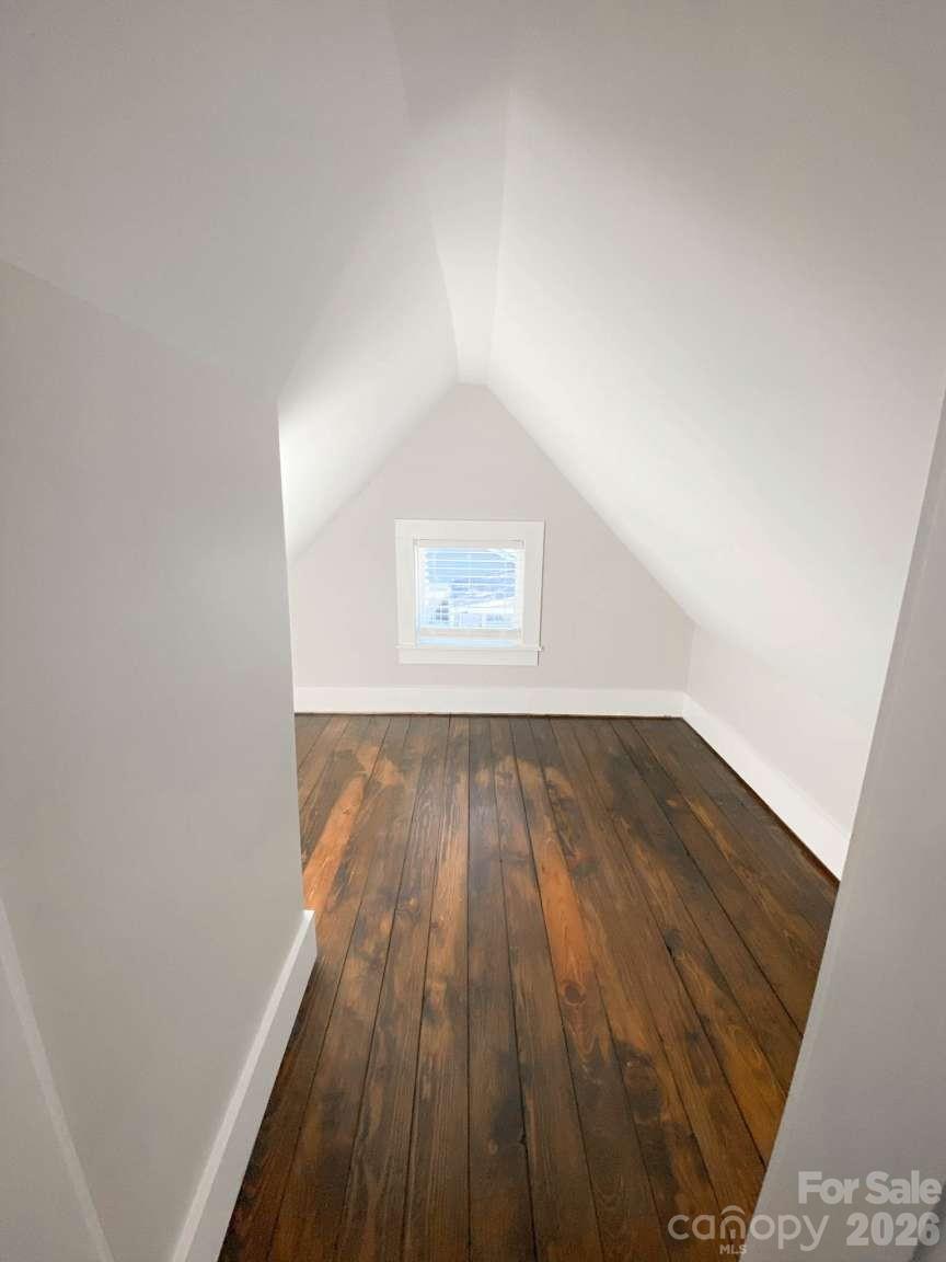 141 Carnegie Road Rutherfordton, NC 28139 - Photo 27 of 45 an empty room with wooden floor and windows