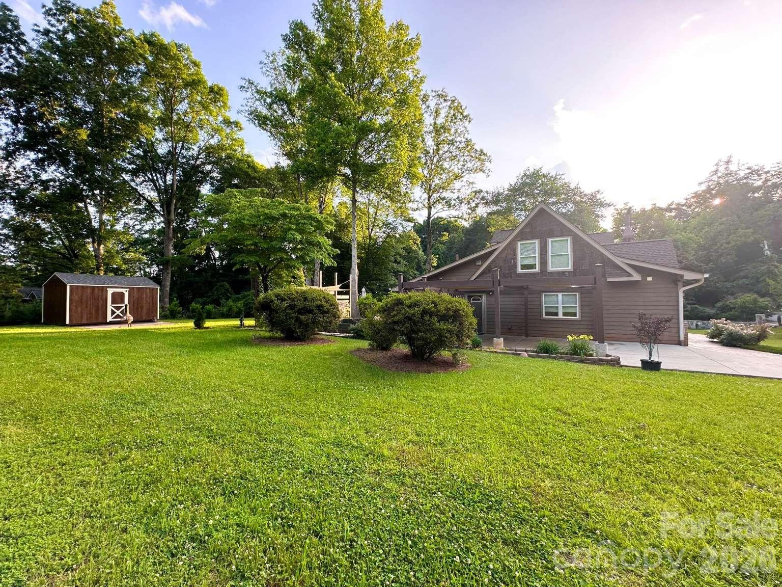 141 Carnegie Road Rutherfordton, NC 28139 - Photo 40 of 45 a front view of a house with garden