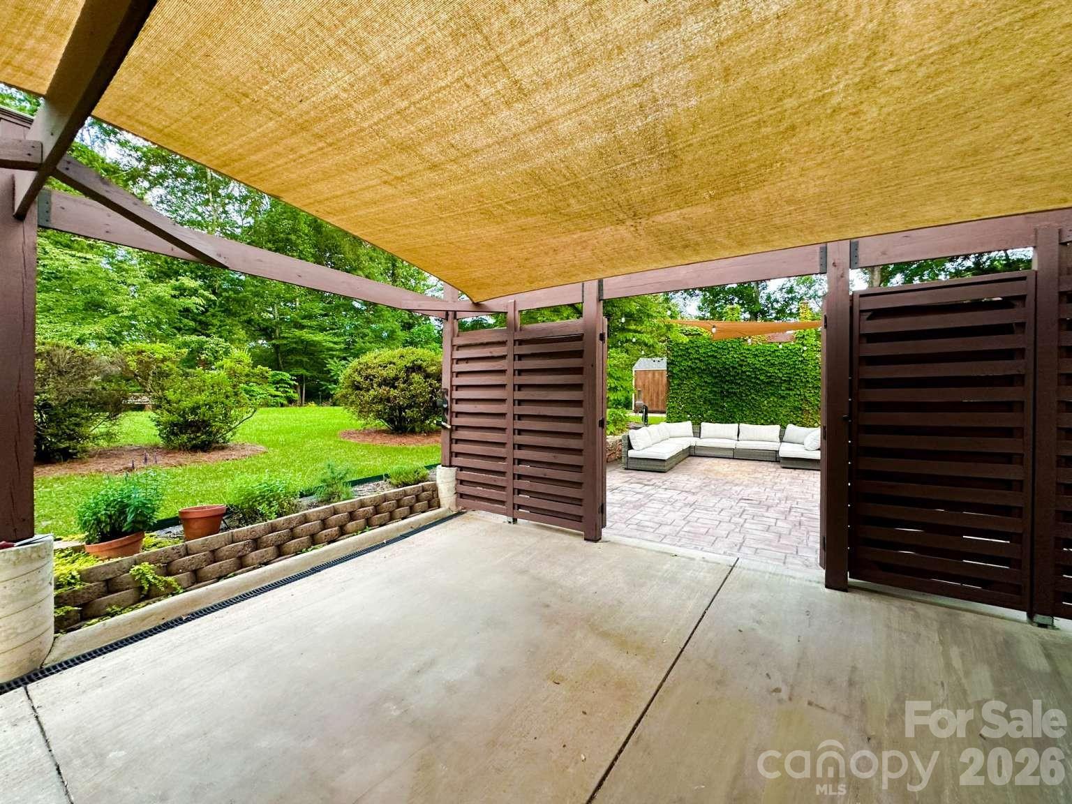 141 Carnegie Road Rutherfordton, NC 28139 - Photo 44 of 45 a view of a garden with an outdoor seating