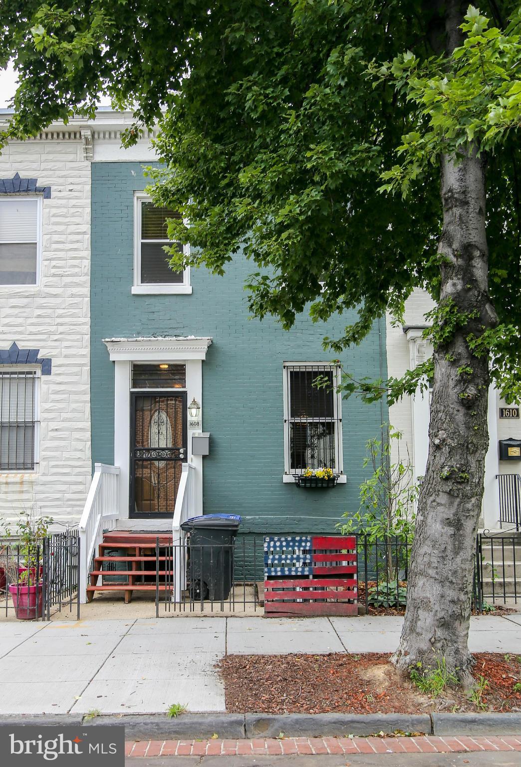 1608 4th Street Northwest Washington, DC 20001 - Photo 2 of 24 a front view of a house with a tree