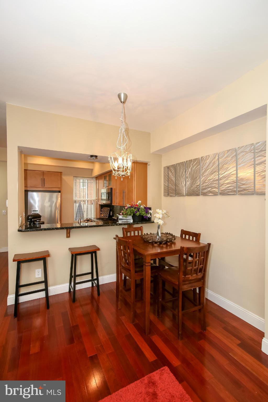 1608 4th Street Northwest Washington, DC 20001 - Photo 5 of 24 a view of a dining room with furniture window and wooden floor