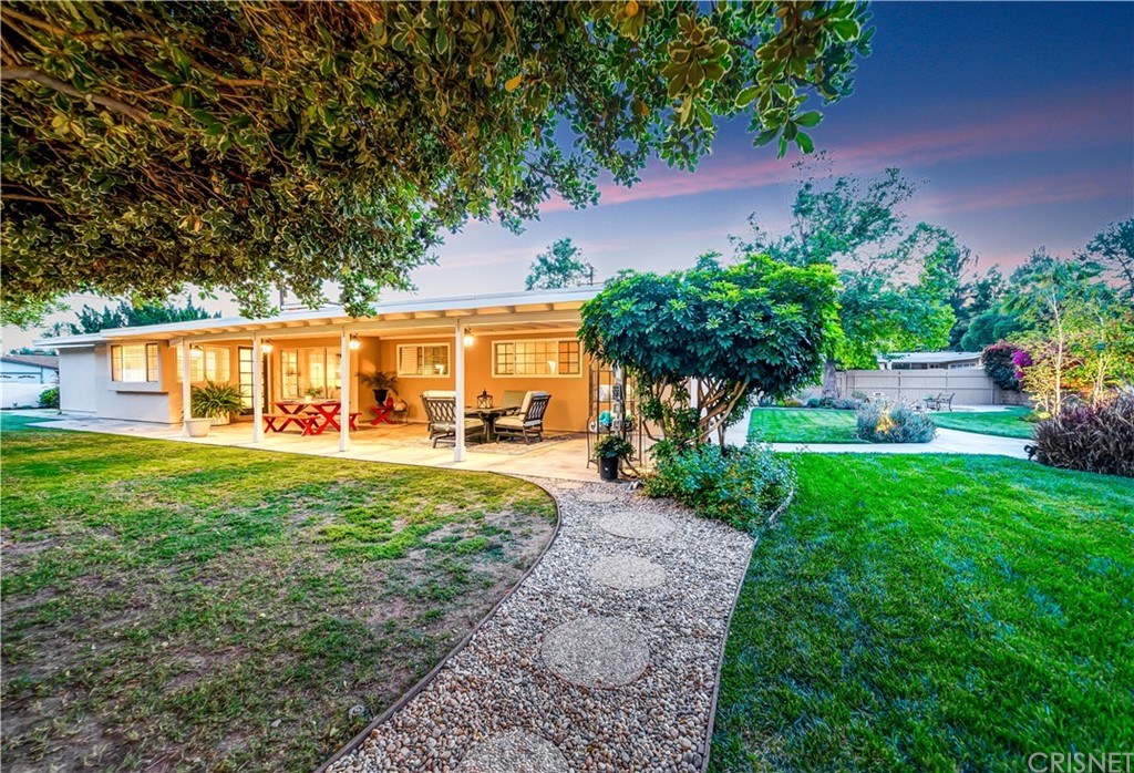 7078 Deveron Ridge Road West Hills, CA 91307 - Photo 35 of 62 a view of a house with backyard and a garden